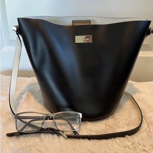 Kate spade bucket bag  9 in tall  12 in wi it’s also 12 in around the bottom